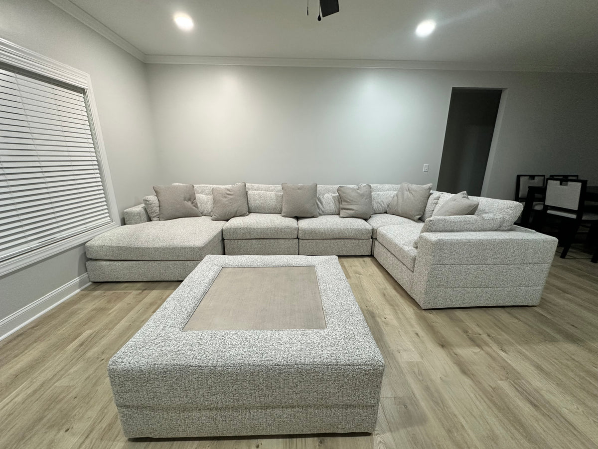 Alcott sectional with oversized ottoman in a customer's living room