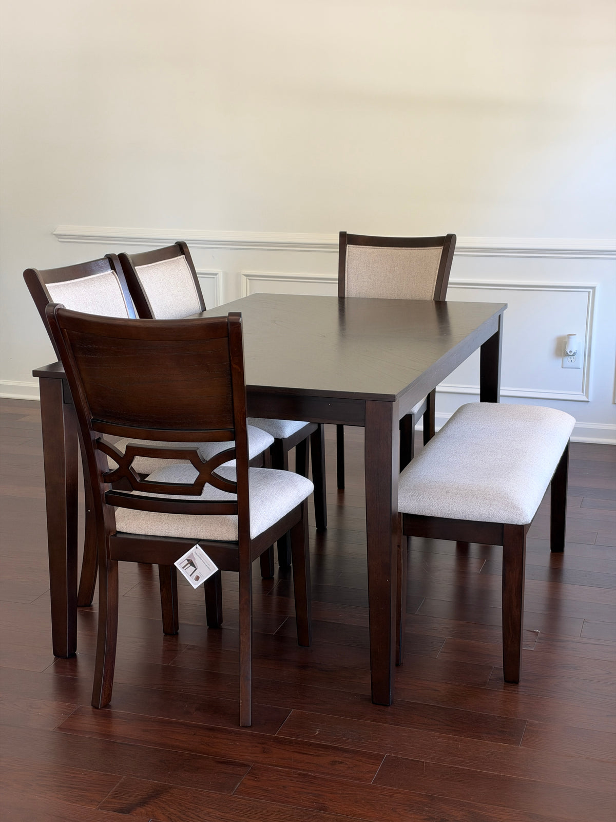 Langwest Dining Table and 4 Chairs and Bench (Set of 6) in a customer’s home